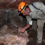 Hamanasi tour guides show ancient pottery shards from Mayan ceremonies